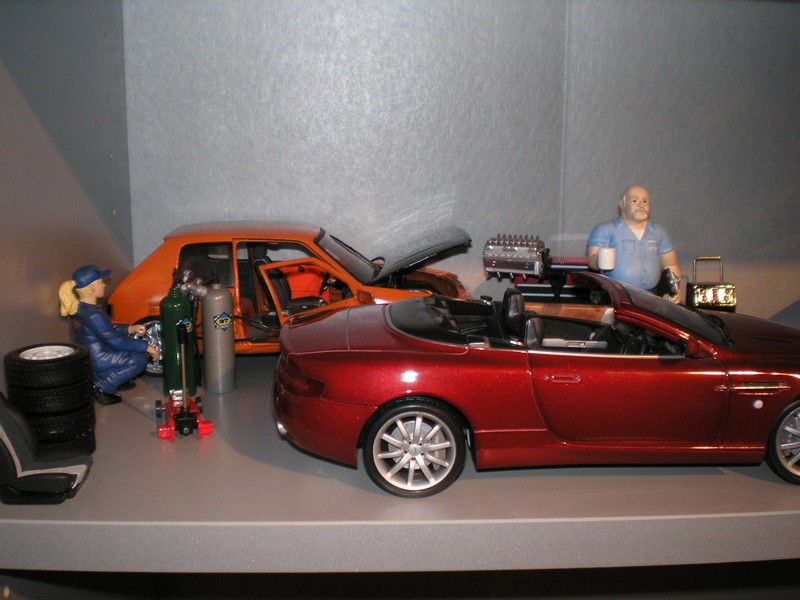 Le garage ou la 205 reçoit un turbo de focus wrc, couleur orange lambo, et échangeur sur Pc Av.