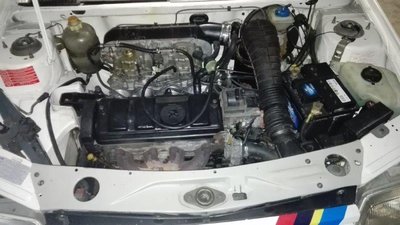 Suite à la remise en état du compartiment moteur, il me manque juste la pipe d'admission de 205 =&gt; l'artifice entre les boîtes à air car c'est une pipe d'admission d'AX sport...